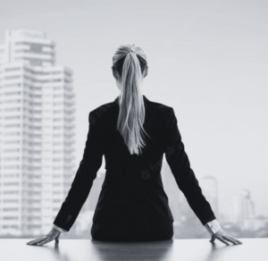 contact us, woman loooking out her office window, about us