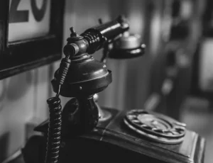 ROTARY telephone in black and white contact us